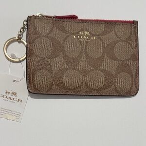 Coach Signature C Design-with Gold Details, with a pop of red